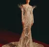 Robe de soirée vêtements femme Balqeesfathi Nawalelzoghbi Blanc Manches longues Épaule dénudée Sirène Argent Perles de cristal Yousef aljasmi Myriam fares