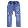 Wiosna Jesień Chłopcy Kowbojskie Spodnie Nowy 2022 Koreańska wersja Moda Dżinsy Elastyczne Talii Slim Casual List Spodnie dla dzieci G1220