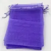 100pcsの紫色のオーガンザジュエリーギフトポーチバッグは、結婚式の好意、ビーズ、ジュエリー7x9cmのためのポーチバッグです。 9x11cm .etc。