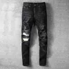 Jeans da uomo Pantaloni hip-hop classici Jeans da stilista Jeans da motociclista strappati strappati Jeans da motociclista slim fit 0GX7