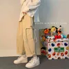 Spodnie Cargo Mężczyźni Techwear Wiosna Koreański Loose Hip Hop Proste Wild Wide-Leg Casual Spodnie Streetwear Pocket Khaki Spodnie dresowe G220224