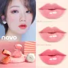 Novo Plant Essential Olje Lip Balm Reparation Exfoliating Scrub Fade Lines Fuktig och närande Hydrating Lips Care Cream Makeup