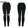 Neue weiße Loch zerrissene Jeans Frauen coole Denim hohe Taille elastische Hosen Capris weibliche dünne schwarze lässige Bleistiftjeans HO833795 201029