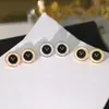 Pinte rotonde con orecchini a diamante Orecchini di design nero Accessori in acciaio inossidabile Orecchini dorati Oreni 4279669