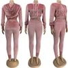 Set in due pezzi di velluto Abbigliamento da festival da donna Top corto con cappuccio a maniche lunghe e pantaloni lunghi con elastico in vita Tute in velluto da donna