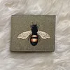 Sacs de portefeuilles courts d'abeille imprimés classiques pour hommes porte-cartes pour dames portefeuilles de clés en cuir véritable pvc pour hommes taille 11x9cm274M