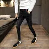 Jesienna i zimowa moda przyczynowa nastolatki Kowbojów Social Men's Duch Guy Guy Pants Male Korean Trend Slim Feet Tight Dżinsy 201128