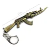 Keychains 빈티지 골드 카운터 스트라이크 총 키 체인 남자 CS Go Gun Trinkets 기념품 남자 친구를위한 선물 키 체인 보석 선물 FRED22