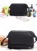 Borsa per il trucco alla moda Custodia con cerniera in tessuto nero elegante bellezza custodia per cosmetici di grande capacità classica borsa per organizer per trucco da toilette 240j