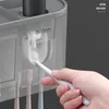 Väggmonterad magnetisk tandborstehållare automatisk tandkräm dispenser stark adsorption magnetisk kopp badrumstillbehör set lj314b