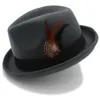 Stingy Brim Hattar Kvinnor Mäns Feminino Felt Fedora Hat för Lady Vinter Höst Ull Roll Up Homburg Jazz Feather1