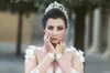 Robe de mariage Arabisches Hochzeitskleid 2019 Sheer Neck Long Sleeves Ballkleid Kapelle Zug Applikationen Tüll Brautkleider