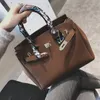 platinum color handbags
