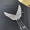 Fermaglio per capelli con nappa in cristallo Elegante fermaglio per capelli con ala in strass Catena in argento Ornamento fata Clip per capelli da donna brillante