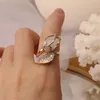 Sydkorea039S Nya designmodesmycken utsökta koppar inlagd zirkon opal tulpan kreativ öppning ring kvinnlig prom party ri3349723