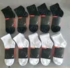 мужские носки Женщины Мужчины Высококачественный хлопок Универсальные классические носки до щиколотки Дышащие черно-белые смешанные футбольные баскетбольные спортивные носки оптомC145