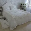 white ruffled bedspread