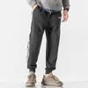 Pantaloni da uomo Jogger a righe Pantaloni lunghi da sudore casual Abbigliamento fitness dritto Hip Hop High Cargo Street Wear 201109