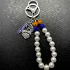 Lettre grecque populaire société SIGMA GAMMA RHO sororité bijoux caniche pendentif porte-clés blanc perle chaîne porte-clés