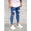 Man Hål Elasticitet Jeans Fashion Trend Pleaket Button Zipper Denim Trousers Designer Man Höst Ny All-Match Casual Skinny Pencil Byxor