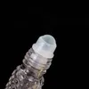 エッセンシャルオイル香水瓶の上の10mlの滑り止めのクリアエッセンシャルオイルボトル携帯用旅行の空のガラスロール
