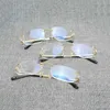 Kvinnors modedesigner solglasögon vintage Rimless Square Clear Men ovala trådglasögon Optisk metallram överdimensionerade glasögonkvinnor för att läsa oculos