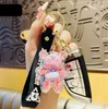 Keychains Creative 3D Animal X-RAY Battery Bear Game Figures Keychain Arylic Doll Cosplay Key Ring DIY Car Holder Anime Trinket D972 Fred22