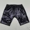 Uomini PVC Shorts in pelle finta outfit di performance per uomini pantaloncini di lingerie olio luccicante jockstrap fetish stretto sexy club nero g226663746