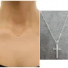 small gold cross pendant necklace