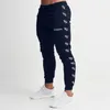 Baumwolle Mode Sport Anzug Jogger Marke Workout Kleidung Streetwear Jacke und Herren Hosen 201109