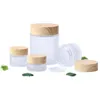 Frosted Glass Jar Cream Flaskor Runt kosmetiska burkar Hand Face Packing -flaskor 5G 10G 15G 20G 30G 50G JARS MED TRÄ LID COVER9219278