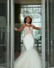 2021 Lyxiga Sydafrika Kristaller Pärlor Mermaid Bröllopsklänningar High Neck Sheer Långärmade Glänsande Formella Bröllopklänningar Vestidos de Novia