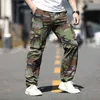 Mege Camouflage夏の戦術的な貨物のズボン軍のワイドレッグワーク衣料品カジュアルストリートウェアクイックドライアウトドアコンバットズボンH1223