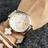 Fashion M Flower Design Brand Orologi da donna Uomo Donne Unisex Metal Steel Band Quarzo Orologio da polso da polso da donna Guarda casual