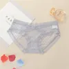 Sexig transparenta spetsbyxor Kvinnors underkläder Låg midja andningsbara trosor Kvinnliga kläder kommer och sandig gåva