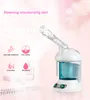 Freeshipping Portable Damp Ozone Vaporizador Facial Steamer Face Care Hud Koppla av Fuktkräm Skönhet Arom Herbal Steaming Face Spa Device