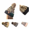 Leopard Animal Imprimé tricot fausse fourrure pompom bonnet de bonnet d'hiver femme tricot chaud fausse fourrure