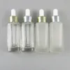 霜透明なガラスのエッセンシャルオイルのびんは、1オンス容器30ml透明な香水瓶20pcs