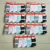 Garçon homme et fille femmes chaussettes lettre coton mi-longueur pure couleur sport sport décontracté confortable respirant mode