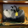 De nieuwe 2022 jongens unisex dames mannen duffel tassen man lezen grote capaciteit korteafstand reistoerisme vrouwelijke handbag186oo