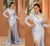 Elegant Silver Mermaid Evening Dresses 2022 Long Sleeve Sheer Neck Side Split Beaded Stain Arabic Prom Pageant Dress Formal Party gowns Special Occasion Wear