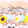 Cross-border beaded food grade silicone sunflower keychain can be printed round pendant key ring wholesale multi-color optional