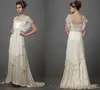 2022 Vintage Ivory Boho Beach Suknie ślubne Formalne suknie ślubne Kryształy Zroszony Kryształy Cape Rękawy Catherine Deane Lita Skromna Wróżka Koronka V-Neck Pełna Długość Bride Dress