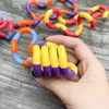 I bambini adulti rilassano terapia anti -stress giocattoli antidri di dita tortuosa intrecciata per i bambini Destrezza autismo che allenasse a focus4661717
