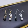 Femmes breloque asymétrique potins Tai Chi Yin Yang blanc noir amitié Couple pendentifs balancent boucles d'oreilles bijoux