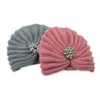 Vendita all'ingrosso 10 colori gratuiti donna nuova moda boemia cappelli lavorati a maglia uncinetto twist autunno caldo adulti berretti da donna berretti invernali