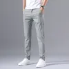 Mens dunne broek vaste kleuren broek slim casual zakelijk fit body stretch broek mannen katoen formeel ademende broek 201110