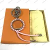 Fashion New Design Flowers Flowers Tassel Key Chain Accessories Key Ring Metal Patterm Patter Car Women Bag Sender Leather Cay Chchain с 6758029