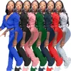 Pontas de calças 2023 European American Feminina Solid Sold Color Fold Pocket Capuz de traje esportivo