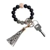 Porte-clés jonc en perles de silicone avec pompon pour les faveurs du parti des femmes, bracelet porte-clés bracelet